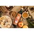 Sonnentor organic apple magic punch syrup with cookies, spices, and a cup of apple punch