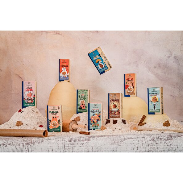 Organic cookies from Sonnentor, including honey hearts, arranged in a Christmas baking setting