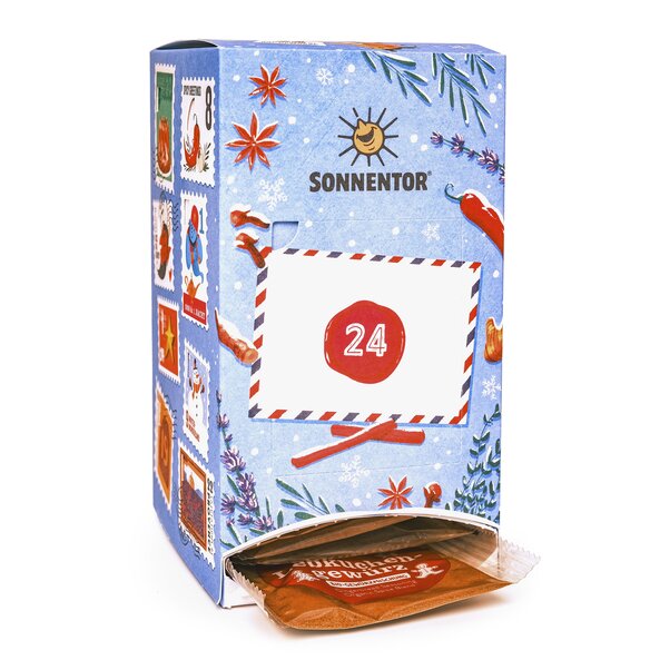 Opened spice advent calendar with organic "Gingerbread spice" sachet