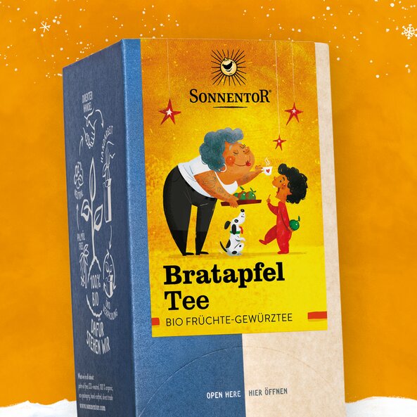 Packaging of Sonnentor baked apple tea, organic fruit and spice tea with winter illustration