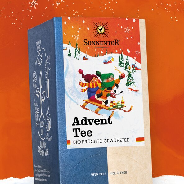 Verpackung von Sonnentor Advent Tee, Bio Früchte-Gewürztee mit winterlicher Schlittenillustration