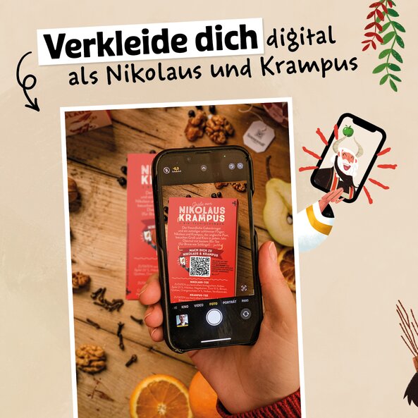 Hand hält Smartphone, Text: "Verkleide dich digital als Nikolaus und Krampus"