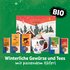 Winter-themed Sonnentor gift box with teas, spices, mug and text "Winter spices and teas with matching mug", organic