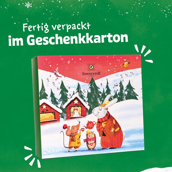 Closed Sonnentor gift box with winter illustration and text "Ready packed in a gift box"