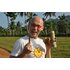 The photo shows Johannes Gutmann holding cinnamon bark in his hands.